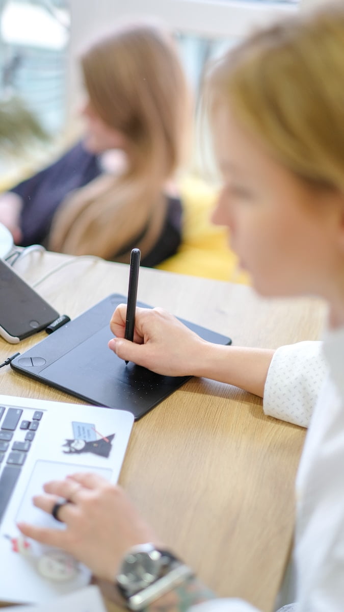 person using Macbook